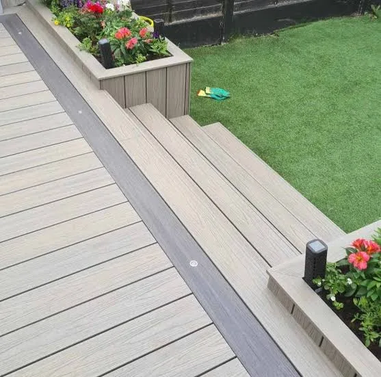 Composite decking with raised planter and steps