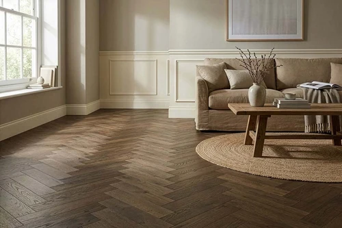 Finished dark herringbone floor in living room
