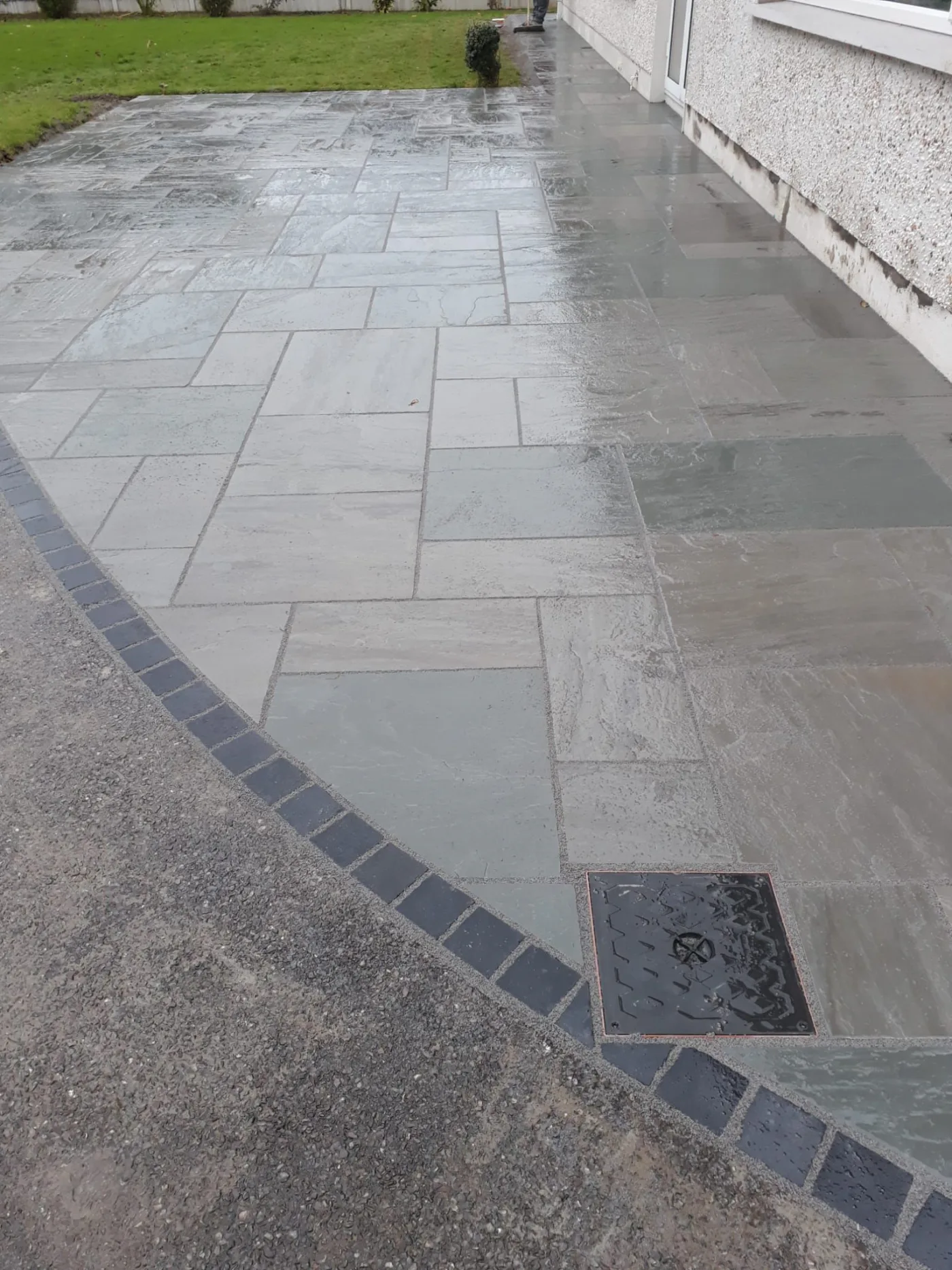 Grey porcelain patio installation