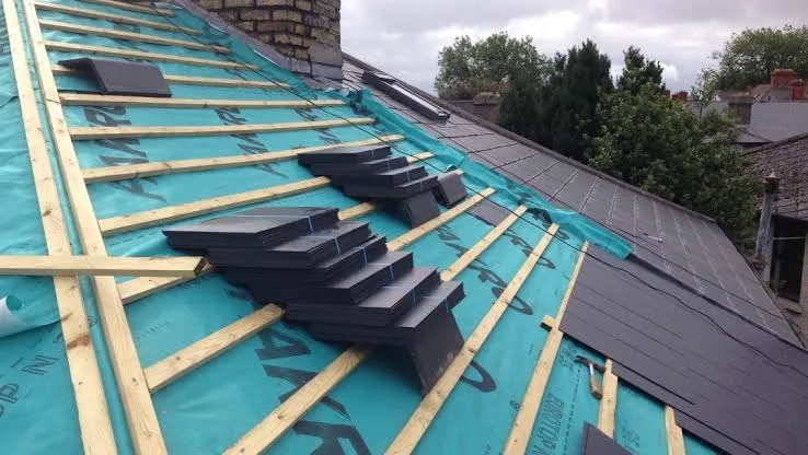 Roof re-tiling in progress